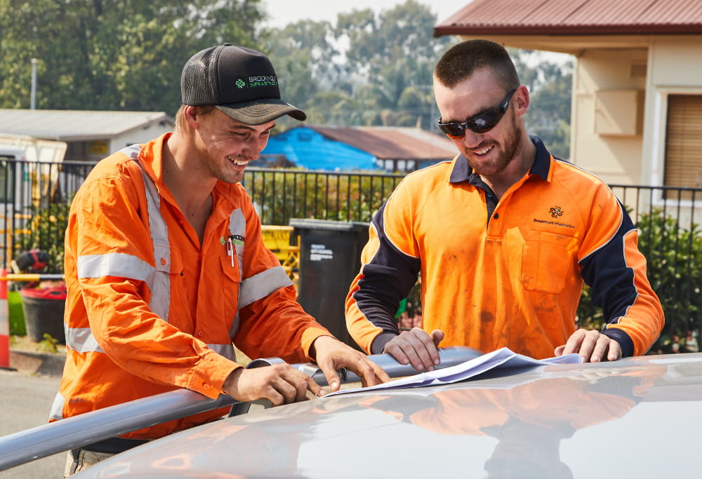 Happy workers discussing project