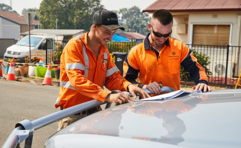 Two workers discussing project