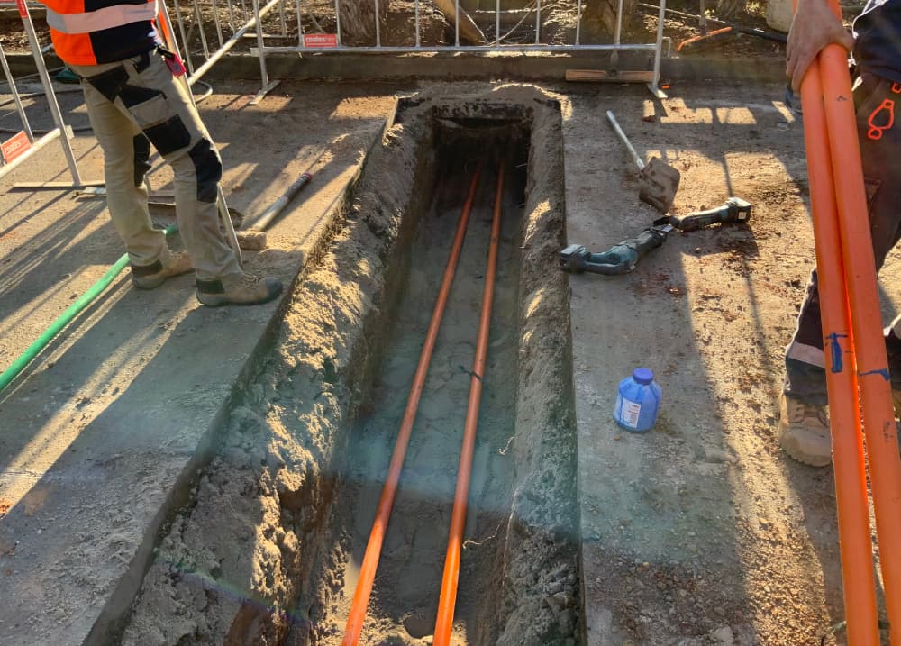 Man standing near the digging area